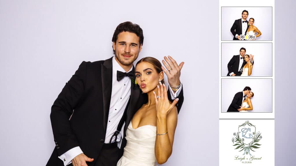 A newlywed couple in formal attire pose playfully at the Digital Photo Booth, showing off their wedding rings. To the right, three smaller photos capture fun moments together, and below is a wedding monogram with &ldquo;Lynch Grant&rdquo; and the date 24.03.23.